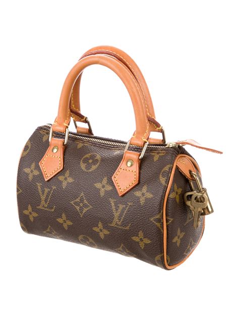 louis vuitton monogram mini purse zipper top vachetta strap